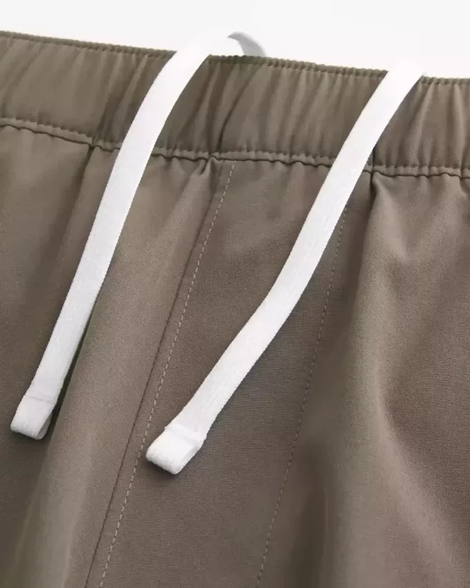 Pantaloni scurți activi hibridi la jumătatea coapsei