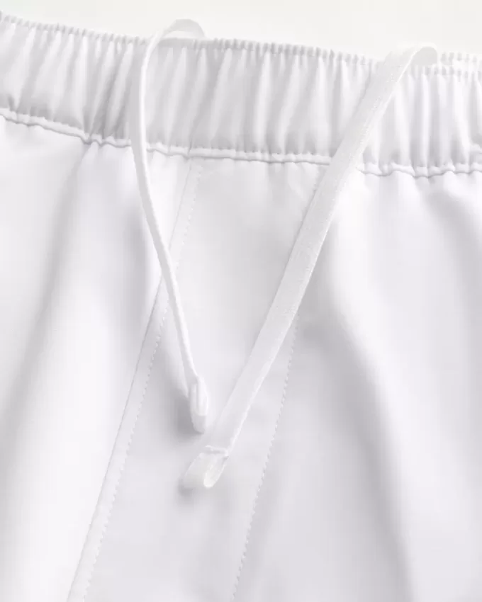 Pantaloni scurți activi hibridi la jumătatea coapsei