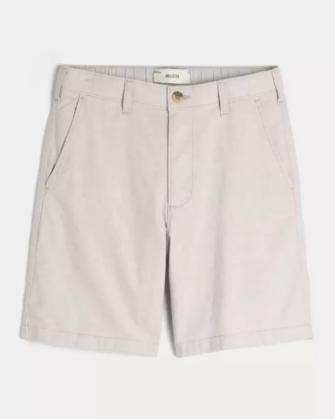 Pantaloni scurți cu fața plată din amestec de in până la genunchi