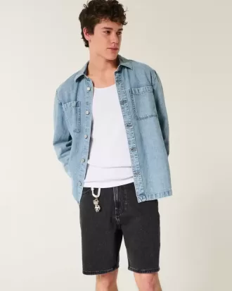 Pantaloni scurți de denim largi deasupra genunchiului
