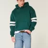 Pantaloni scurți de denim largi deasupra genunchiului Pantaloni scurți de denim largi deasupra genunchiului
