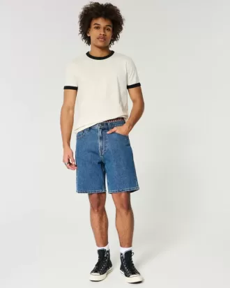 Pantaloni scurți de denim largi deasupra genunchiului
