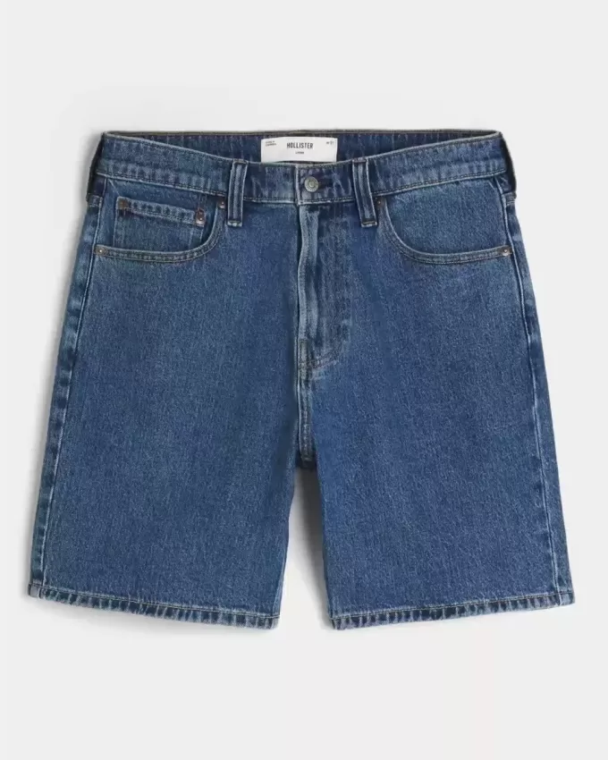 Pantaloni scurți de denim largi deasupra genunchiului Pantaloni scurți de denim largi deasupra genunchiului