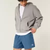 Pantaloni scurți de fotbal largi la jumătatea coapsei Pantaloni scurți de fotbal largi la jumătatea coapsei