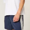 Pantaloni scurți de fotbal largi la jumătatea coapsei Pantaloni scurți de fotbal largi la jumătatea coapsei