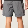 Pantaloni scurți de fotbal largi la jumătatea coapsei Pantaloni scurți de fotbal largi la jumătatea coapsei