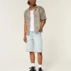 Pantaloni scurți din denim super largi cu grafic Dice Light Wash