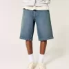 Pantaloni scurți din denim super largi, cu spalare închisă sub genunchi