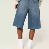 Pantaloni scurți din denim super largi, cu spalare închisă sub genunchi