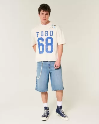 Pantaloni scurți din denim super largi, cu spălare medie sub genunchi