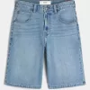 Pantaloni scurți din denim super largi, cu spălare medie sub genunchi