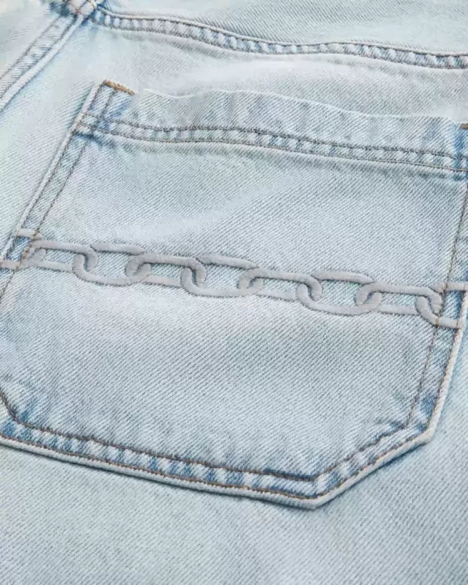 Pantaloni scurți largi din denim cu broderie cu lanț Pantaloni scurți largi din denim cu broderie cu lanț