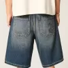 Pantaloni scurți largi din denim cu grafic șarpe