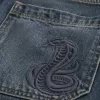 Pantaloni scurți largi din denim cu grafic șarpe