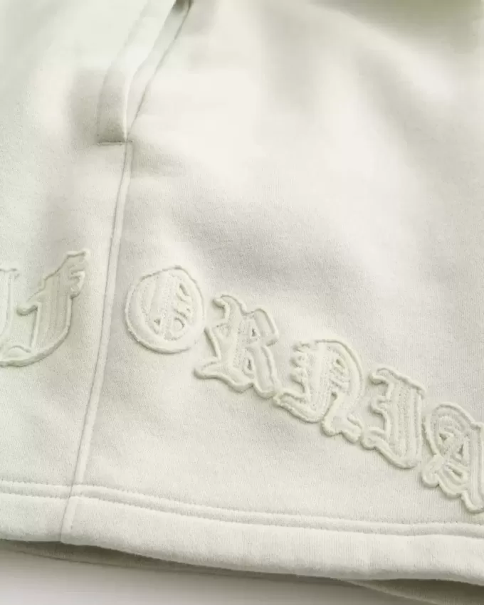 Pantaloni scurți largi din lână Calif cu grafic deasupra genunchiului Pantaloni scurți largi din lână Calif cu grafic deasupra genunchiului