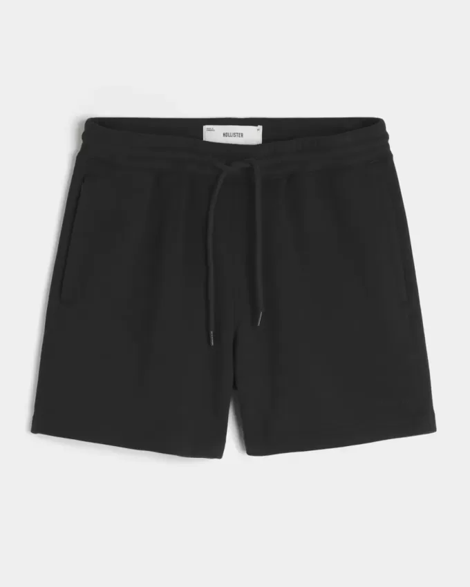 Pantaloni scurți lângi din lână la jumătatea coapsei Pantaloni scurți lângi din lână la jumătatea coapsei