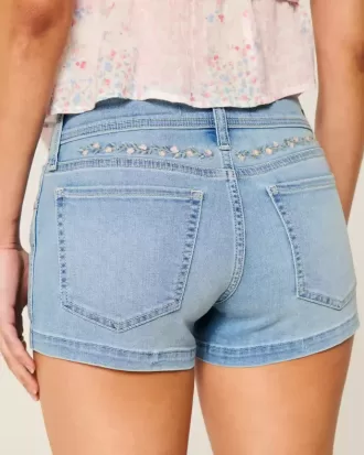 Pantaloni scurti din denim cu talie joasă, cu spalare ușoară, brodate florale