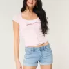 Pantaloni scurti din denim cu talie joasă, rupte, spălate lejer Pantaloni scurti din denim cu talie joasă, rupte, spălate lejer