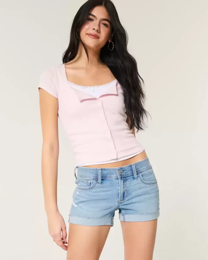Pantaloni scurti din denim cu talie joasă, rupte, spălate lejer Pantaloni scurti din denim cu talie joasă, rupte, spălate lejer