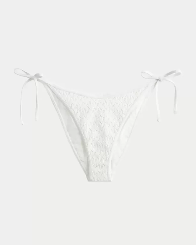 Partea de jos de bikini cu cravată laterală în stil croșetat cu paiete Partea de jos de bikini cu cravată laterală în stil croșetat cu paiete