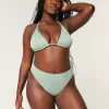 Partea de jos de bikini curbat cu picioare înalte și talie înaltă, cu nervuri Partea de jos de bikini curbat cu picioare înalte și talie înaltă, cu nervuri