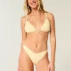 Partea de jos de bikini înfățișată din jacquard cu talie în V cu picioare înalte Partea de jos de bikini înfățișată din jacquard cu talie în V cu picioare înalte
