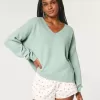 Pulover supradimensionat cu decolteu în V Hollister Comfy Cloud