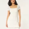 Rochie mini cu mâneci scurte în stil croșetat Rochie mini cu mâneci scurte în stil croșetat