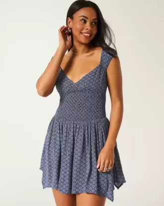 Rochie mini cu tiv asimetric fără umăr