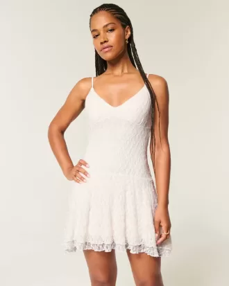 Rochie mini din dantela cu tiv asimetric