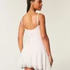Rochie mini din dantela cu tiv asimetric Rochie mini din dantela cu tiv asimetric