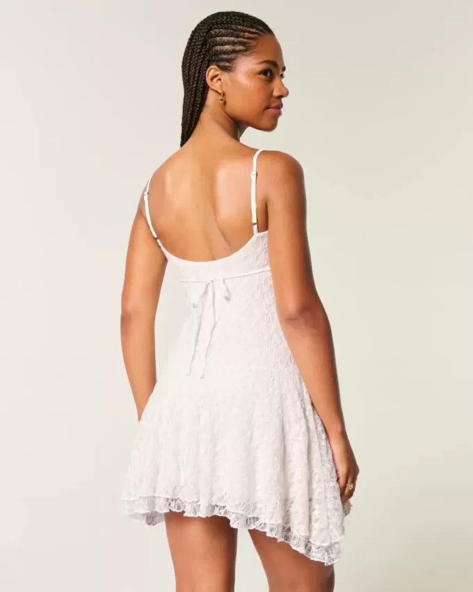 Rochie mini din dantela cu tiv asimetric Rochie mini din dantela cu tiv asimetric