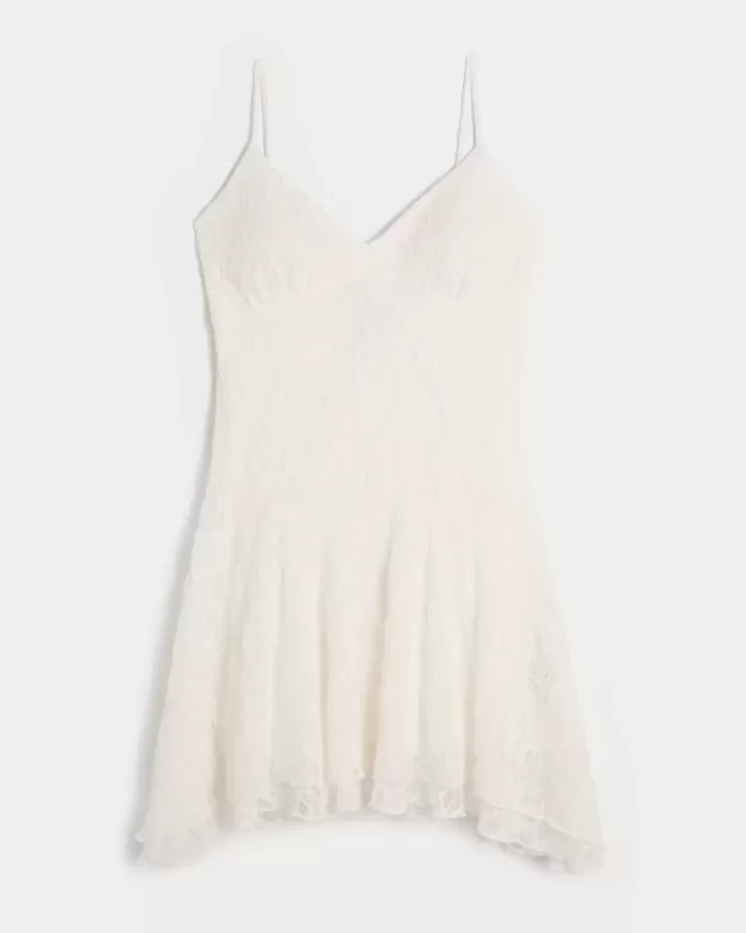 Rochie mini din dantela cu tiv asimetric Rochie mini din dantela cu tiv asimetric