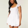 Rochie mini-skort cu maneci fluturate Rochie mini-skort cu maneci fluturate