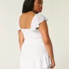 Rochie mini-skort cu maneci fluturate Rochie mini-skort cu maneci fluturate