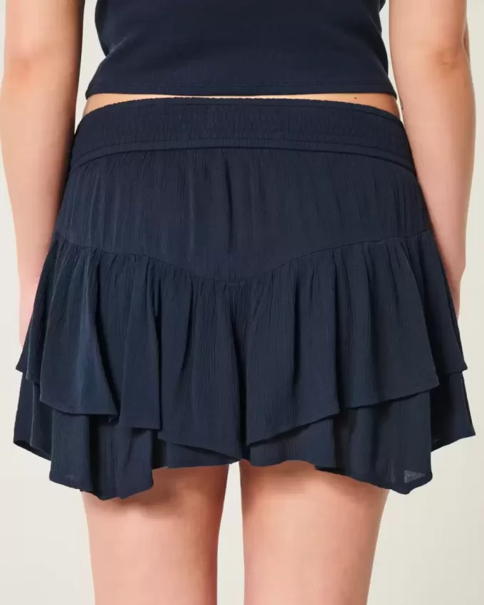 Short mini cu etaje cu tiv asimetric Short mini cu etaje cu tiv asimetric