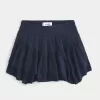 Short mini cu etaje cu tiv asimetric Short mini cu etaje cu tiv asimetric