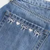 Short mini din denim cu fundă brodat cu talie joasă Short mini din denim cu fundă brodat cu talie joasă