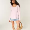 Top Babydoll cu mâneci lungi și cu model floral Top Babydoll cu mâneci lungi și cu model floral