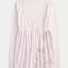 Top Babydoll cu mâneci lungi și cu model floral Top Babydoll cu mâneci lungi și cu model floral
