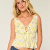 Top peplum cu cravată în amestec de in Top peplum cu cravată în amestec de in