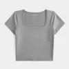 Tricou pentru bebeluși cu gât pătrat din țesătură moale, fără cusături Tricou pentru bebeluși cu gât pătrat din țesătură moale, fără cusături