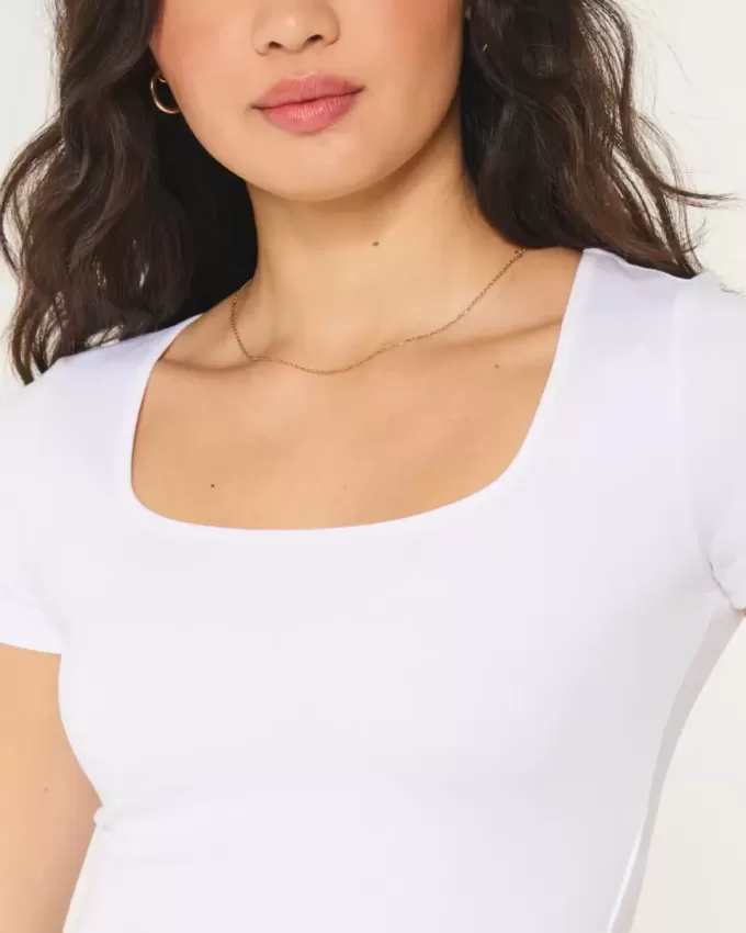 Tricou pentru bebeluși cu gât pătrat din material fără cusături Tricou pentru bebeluși cu gât pătrat din material fără cusături