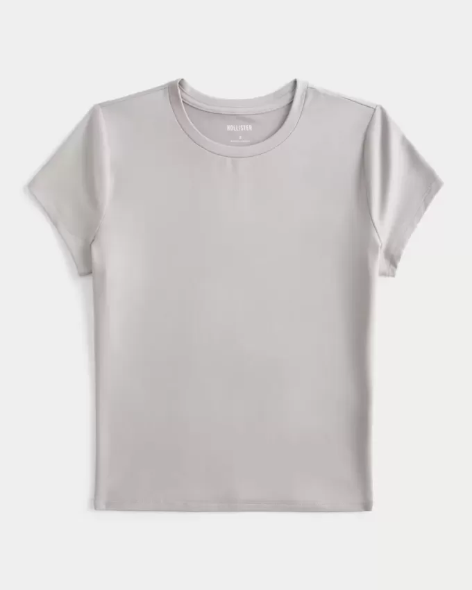 Tricou pentru bebeluși cu paragate din țesătură moale și elastică Tricou pentru bebeluși cu paragate din țesătură moale și elastică